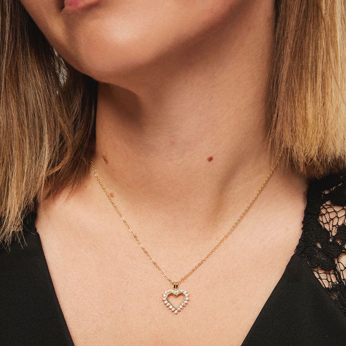 Smykke i forgylt sølv med zirkonia hjerte